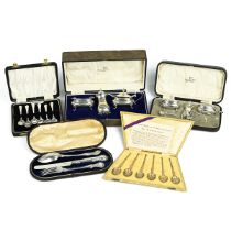 A set of six silver gilt anointing spoons, along with two silver cruets, christening set, teaspoo...