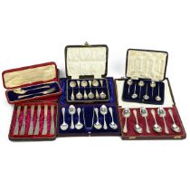 A collection of silver cutlery including shell pattern teaspoons, sugar nips set and various othe...