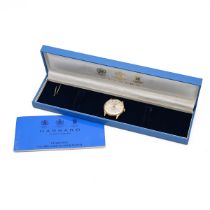 Garrard gold Automatic watch. 35mm case with brushed steel dial. Boxed and guarantee card. Strap ...