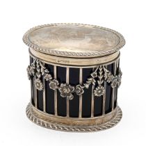 An Edwardian silver sugar box, of oval form, the rail outline decorted with flowers swags, with b...