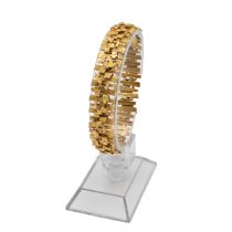 A 9ct gold mid century bracelet, of textured form, in the style of Andrew Grima, 19cm long, hallm...