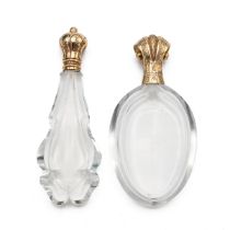 Two Victorian glass scent bottles, both with gold hinged covers, one chased with Greek Key patter...