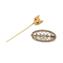 A 9ct gold fox mask pin, set with ruby eyes, 3.28 grams,  along with a gold oval cross hatch set ...