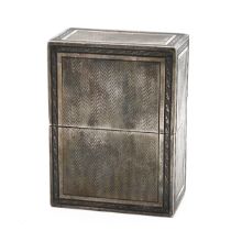 A modern silver engine turned silver box, with a pull over cover, 9.4cm high, 7cm wide, London im...