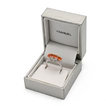 A 9ct white gold three stone fire opal ring, finger size N 1/2, 3.34 grams. (J)