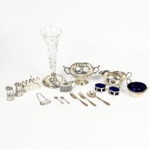 A collecition of miscellaneous silver items items to include a sauce boat, two handled pierced bo...