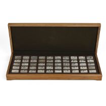 A cased collection of fifty 20th century sterling silver proof ingots, '1000 Years of British Mon...