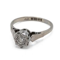 An 18ct white gold and single stone diamond ring, the brilliant cut diamond weighing approximatel...