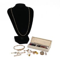 A collection of yellow gold jewellery, including 9ct gold bar brooches, T-bar, dog clip, paste se...