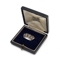 A 20th century silver and paste set brooch in the form of crown, cased. (J)