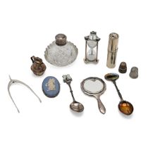 A collection of miscellaneous silver items to include miniature hand mirror, lipstick holder, Jer...