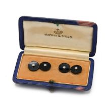 A pair of 20th century black onyx and diamond cufflinks, with gold connectors, in a Mappin and We...
