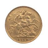 A 1910 half sovereign. (J)