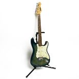 A 'Vintage' John Hornby Skewes Ltd electric guitar in dark blue with white pickguard. Includes a ...