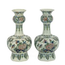 Pair of Delft "Knobbelvaas" vases by Royal Delft with the AO year code for 1919 and the artist co...