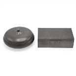 Two pewter boxes: the first in the manner of Liberty and beaten or planished pattern and rectangu...