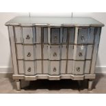 Contemporary Venetian style three drawer mirrored chest of drawers. Wooden frame with silvered fi...