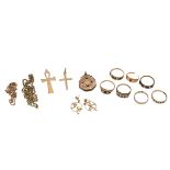 A collection of gold jewellery, including 9ct gold gem set rings, earrings, cross pendants, chain...