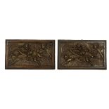Pair cast patinated bronze wall plaques c1920's. Cast as playing cherubs, mounted in a stained wo...