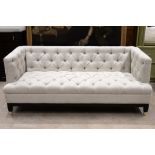 Contemporary two seat box sofa. Upholstered in cream linen with button back detailing. W 188cm, D...