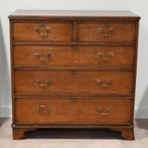 A late Georgian Oak chest of 2 over 3 drawers with brass handles. W 100cm, D 51cm, H 102cm. (C)