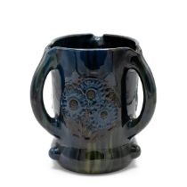 Elton Ware (of Clevedon) tyg, or three handled vessel decorated with flowers on a green/blue grou...