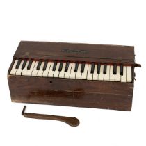 W. Brunt & Sons portable Pump Organ in oak carry case c1900. W 55cm, D 27cm, H 20cm. (M)