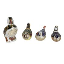 Royal Crown Derby paperweights to include: Puffin - boxed, silver button; blue tit gold button; G...