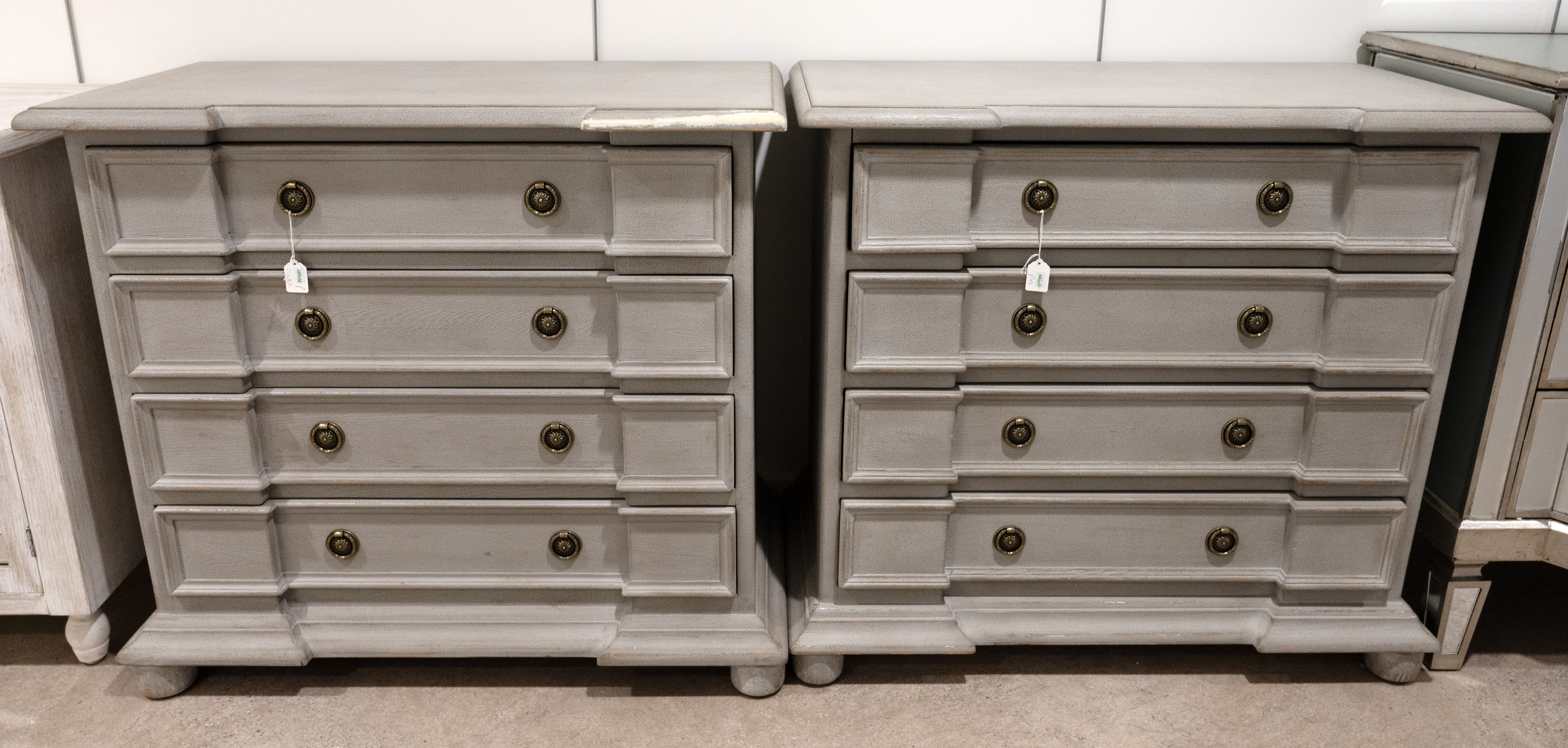 Identical pair of contemporary three drawer inverted breakfront chest of drawers. Solid wood cons...