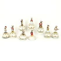 Nine Bunnykins music boxes playing tunes to include Rock-a-by-Baby (two models, one with red jack...