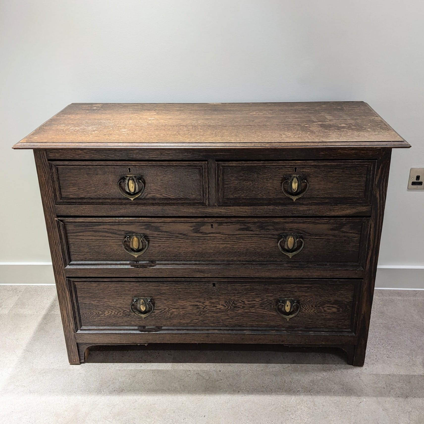 Arts & Crafts oak chest of drawers c1900. Maker label to inside of drawer for 'Charles Lowe & Son...