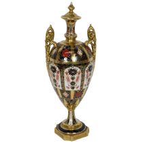 Royal Crown Derby Trophy Vase in the Old Imari pattern SGB 1128 (height 30cm). Stamp mark and yea...