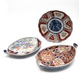 Japanese Meiji period Arita Ware Imari patterned ceramics to include two Takarabune or Treasure S...