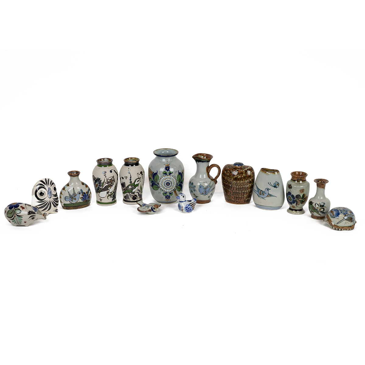 Ken Edwards Mexican pottery - a collection of 14 pieces of including vases, animal figurines and ...