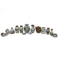 Ken Edwards Mexican pottery - a collection of 14 pieces of including vases, animal figurines and ...