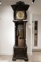 A monumental long case clock. The mechanism by Maple & Co of London, with a three train, eight da...