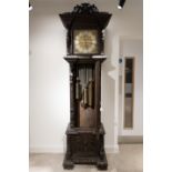 A monumental long case clock. The mechanism by Maple & Co of London, with a three train, eight da...