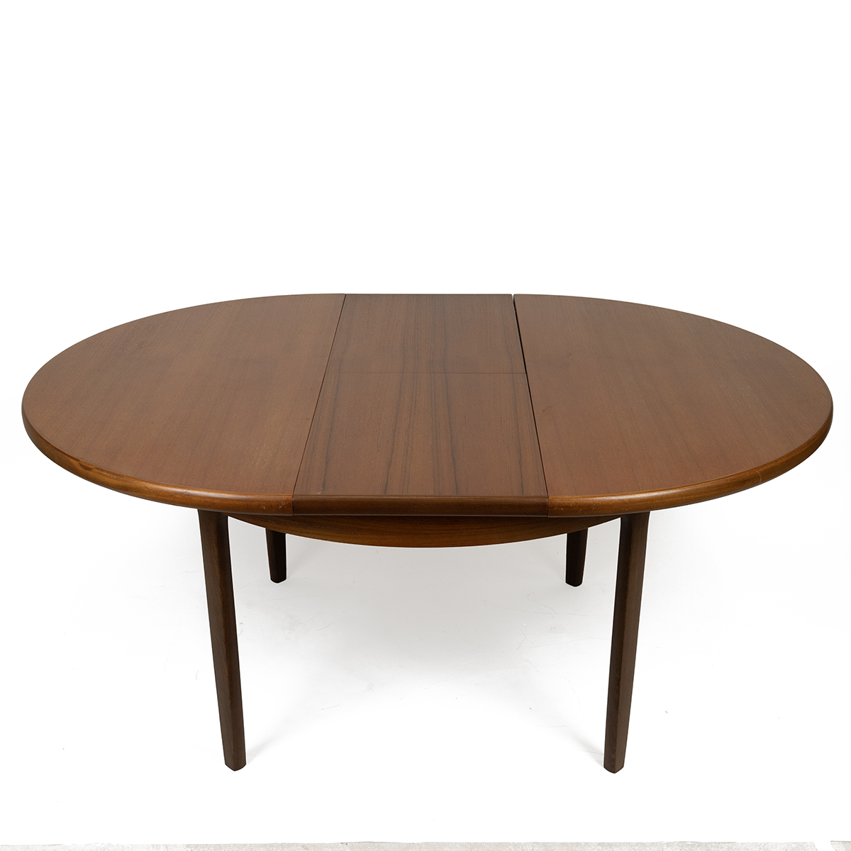 Mid Century 1970s teak circular extending dining table and chairs (4). All unmarked, extra bi-fol... - Image 2 of 4