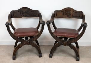 Pair of mid 20th century medieval revival x-framed chairs, possibly Spanish. Fumed wood finish wi...