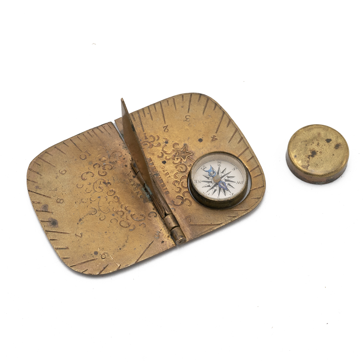 J Baum & Co Patent pocket folding compass marked 1875. Brass body with small recessed compass. Ch...