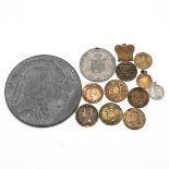 Thirteen (13) medals, tokens, jetons and novelty coins, mainly in bronze. Includes (1) 1793 Franc...