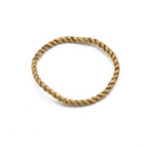 Delicate gold rope twist ring, for a woman or child, likely 16th or 17th century. Around size K. ...
