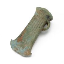 Circa 1000-750 BC Bronze Age socketed axe head with loop suspension and ornamental six-rib design...