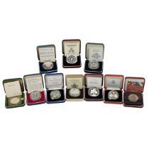 Ten (10) silver proof Royal Mint 25p and £5 Crown coins in original presentation boxes. Includes ...