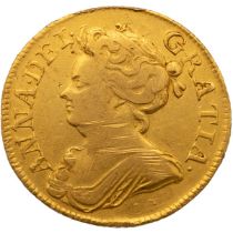 1713 Queen Anne third bust type gold Guinea, issued after the Acts of Union (S 3574, Farey 560). ...