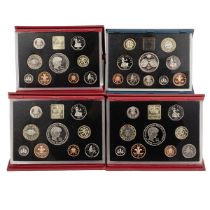 Four (4) late 1990s UK Royal Mint base metal proof annual coin sets, including three 1999 sets. I...