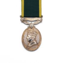 GV Efficiency Medal with clasp 'Militia' of 2324682 Serjeant W.M. NcNeill of the Royal Signals.