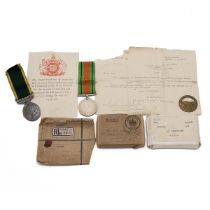 Medals (2) of T-87859 Serjeant A.P. Puddicombe R.A.S.C. (T.A.). Sold with boxes and a commemorati...