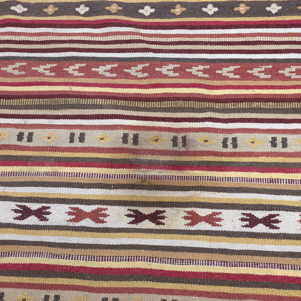 Vintage kilim rug, hand-knotted with a multi-coloured ground, with repeating patterns throughout.... - Image 2 of 3