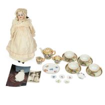 Early 20th Century 11 inch JDK Germany doll, Bisque head and arms with composite body. retaining ...